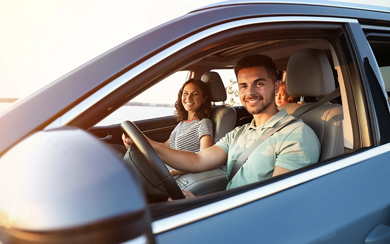 family in car